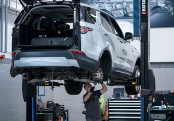 Technician working on a Land Rover
