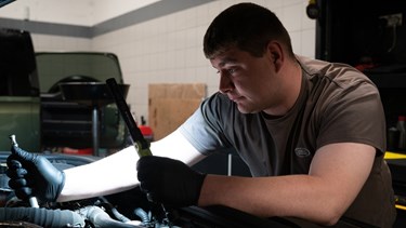 Technician working on a land rover
