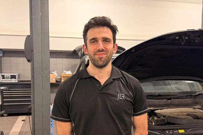 Technician working on a land rover