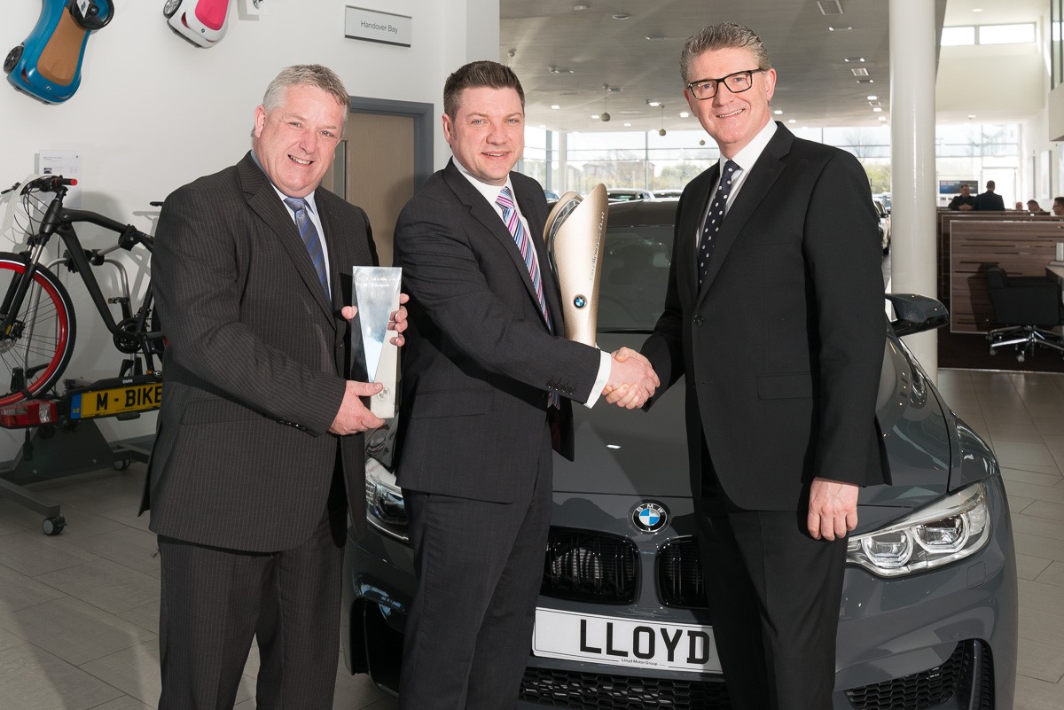 Lloyd BMW Blackpool wins BMW Retailer in Customer Care’ at the prestigious worldwide 2016 BMW Excellence in Sales Awards, held in Munich. Photos: Lloyd  BMW Franchise Director Gary Bingley, Head of Business Mark Powell and CEO of BMW Graham Greaves