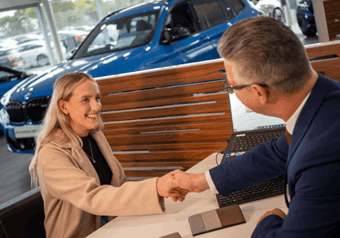A customer buying BMW at Lloyd BMW