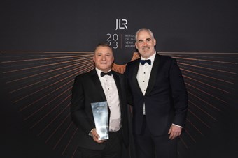 Steve Trickett, Head of Business at Lloyd Jaguar Carlisle, collecting the Retailer of the Year Award