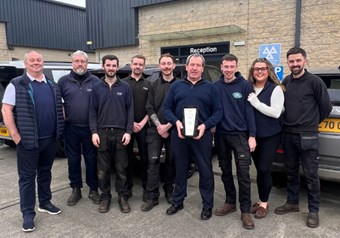 The Lloyd Land Rover Leyburn Service Centre team proudly displaying their award for Authorised Repairer of the Year
