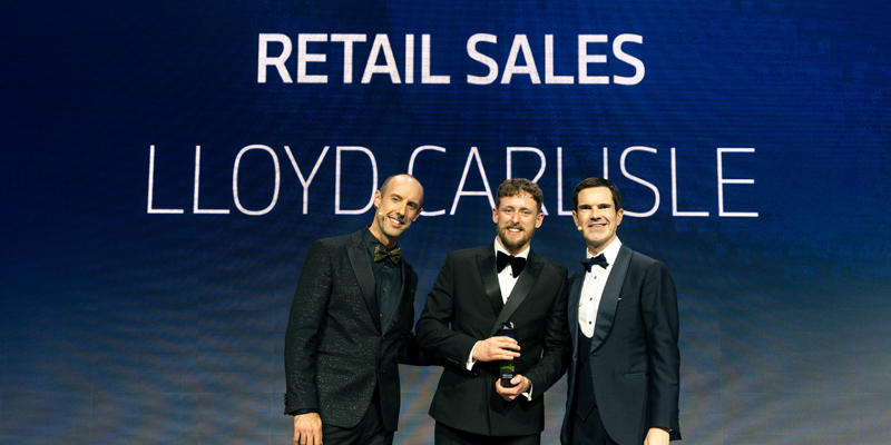 Lloyd Carlisle MINI Brand Manager, Jamie Bingley, collecting the retail sales award.