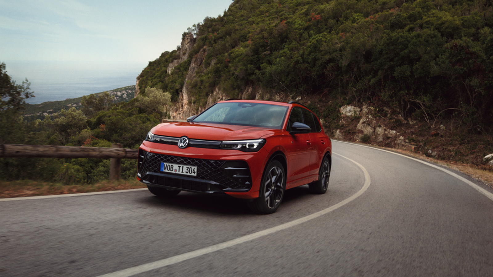 Volkswagen Tiguan driving in a nature landscape